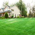 Lush-green-lawn-around-a-perfectly-landscaped-home.jpg